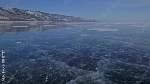 Wallpaper Mural Family is ice skating at day. Girls to ride figure ice skates in nature. Mother and daughter riding together on ice in cracks. Outdoor winter fun for athlete nice winter weather. People on ice skates Torontodigital.ca