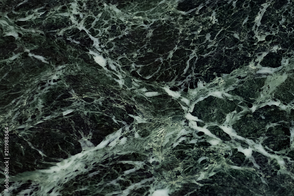Naklejka premium The dark green marble. Texture