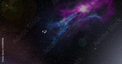 Long shot with lens effects and nebulae: the Magellan spacecraft travelling through empty space . Reversible, can be rotated 180 degrees. Elements of this image furnished by NASA. photo