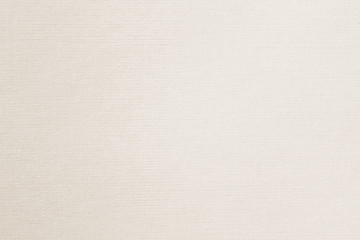 Texture of light cream paper, gentle shade for watercolor and artwork. Modern background, copy space