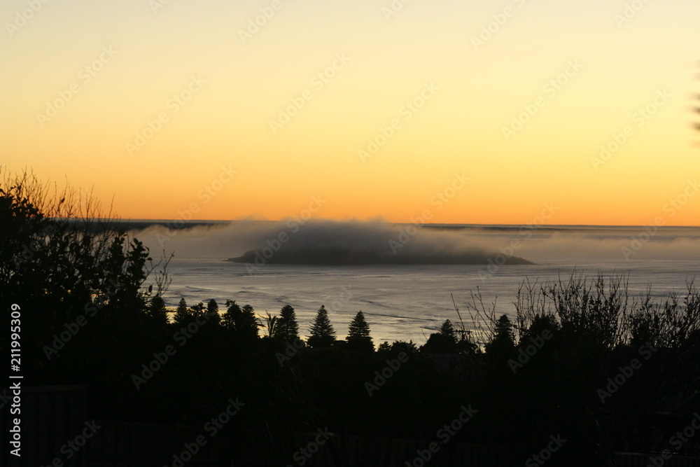 Aerodynamic island under the sea mist Aerodynamic island under the sea mist