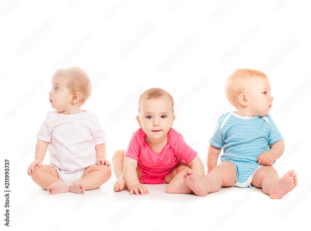 Three babies isolated on white Three babies isolated on white