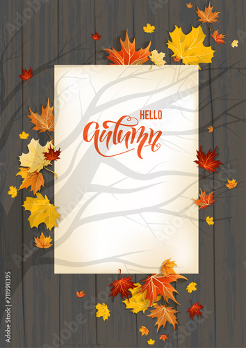 Fall leaves on dark wood background