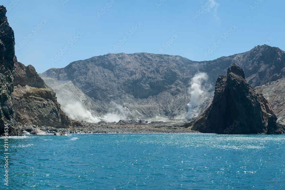 Thermal activity in the crater of the active volcano of White Island, Whakaari, off the Bay of Plenty coast, New Zealand, viewed from the sea.