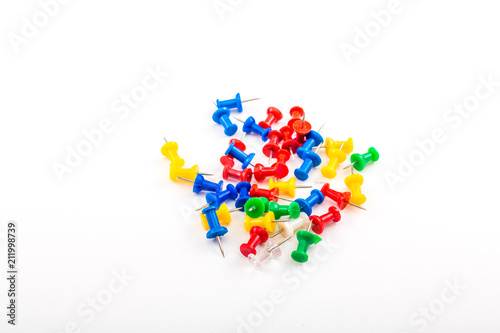Colorful Pushpins on White Background