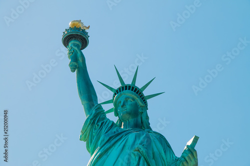 The statue of liberty in New York Harbor. © marls