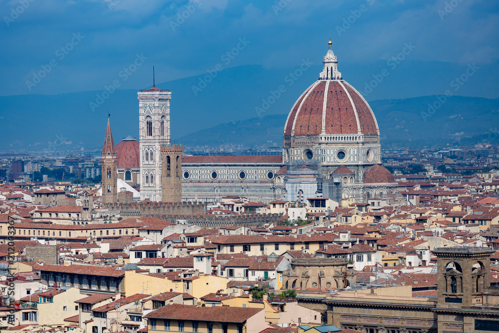 Florence seen from afar with cathedral towering over city