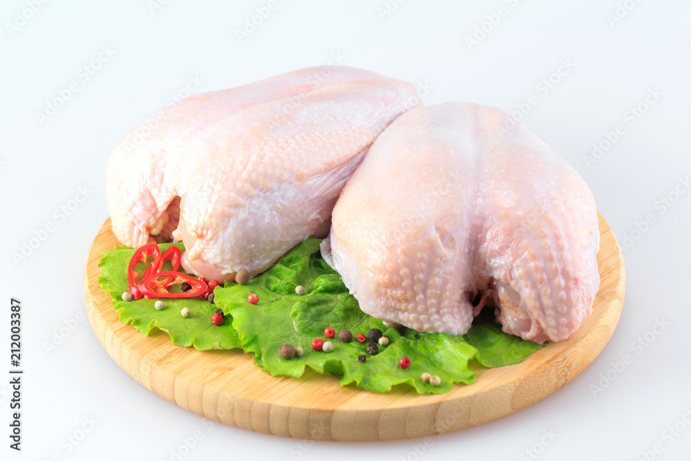raw chicken Breasts on a white background raw chicken Breasts on a white background