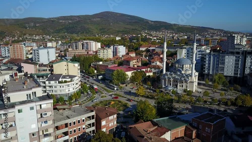 Drone shot of main mosque at central square in South Mitrovica, a city divided into two administrative units after the Kosovo war photo