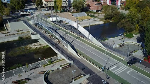 Tilted drone shot of controversial Mitrovica bridge in Kosovo photo