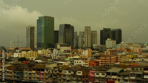 Bangkok, Thailand - June 18, 2018 : 4K High angle view of residential at Ratchadapisek area in Bangkok, Thailand before hard raining photo