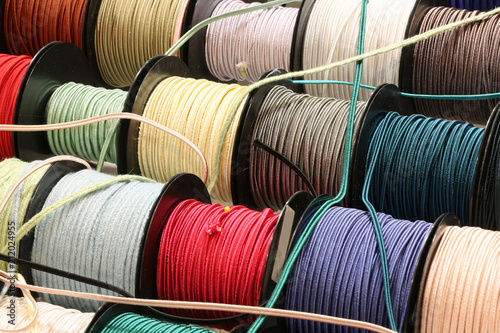 Schilderij op canvas Strands of colored string for sale