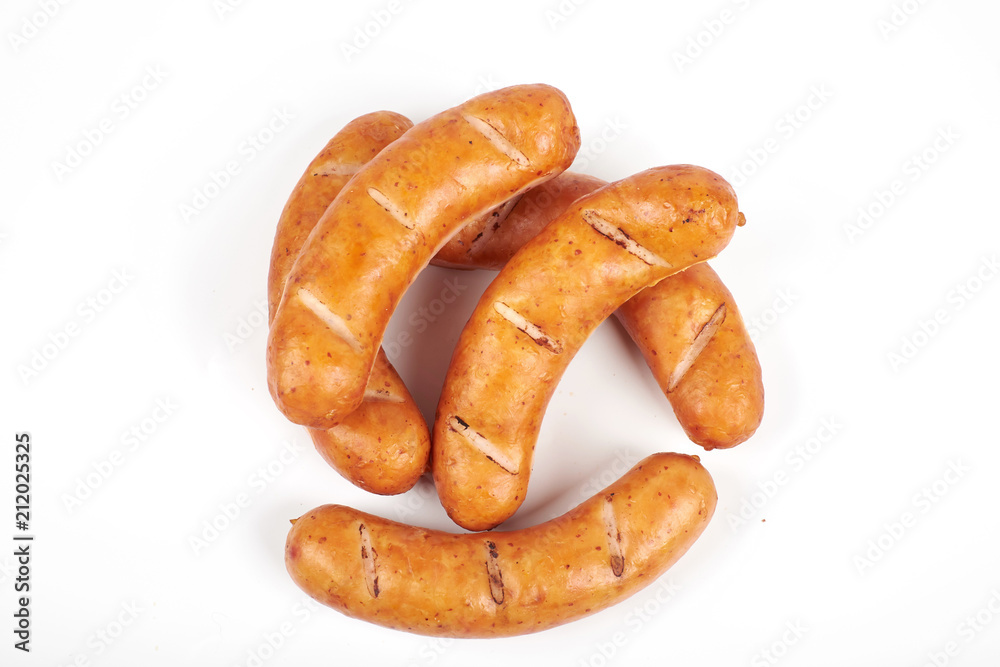 Grilled sausages isolated on a white background Grilled sausages isolated on a white background