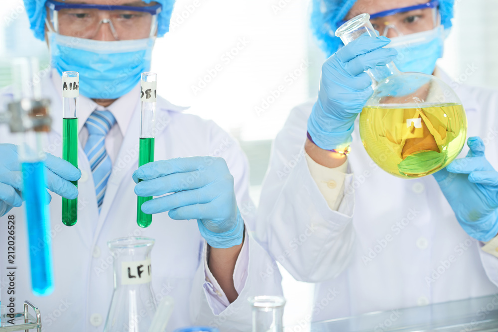 Researchers working in laboratory Researchers working in laboratory