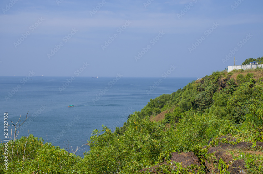 Landscape the tropical beach of Vasco De Gamma in India

