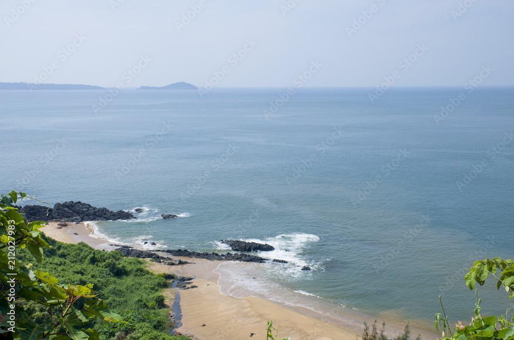 Landscape the tropical beach of Vasco De Gamma in India
