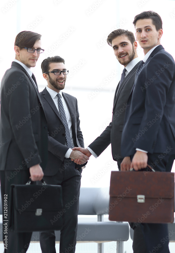 welcome handshake of business partners welcome handshake of business partners