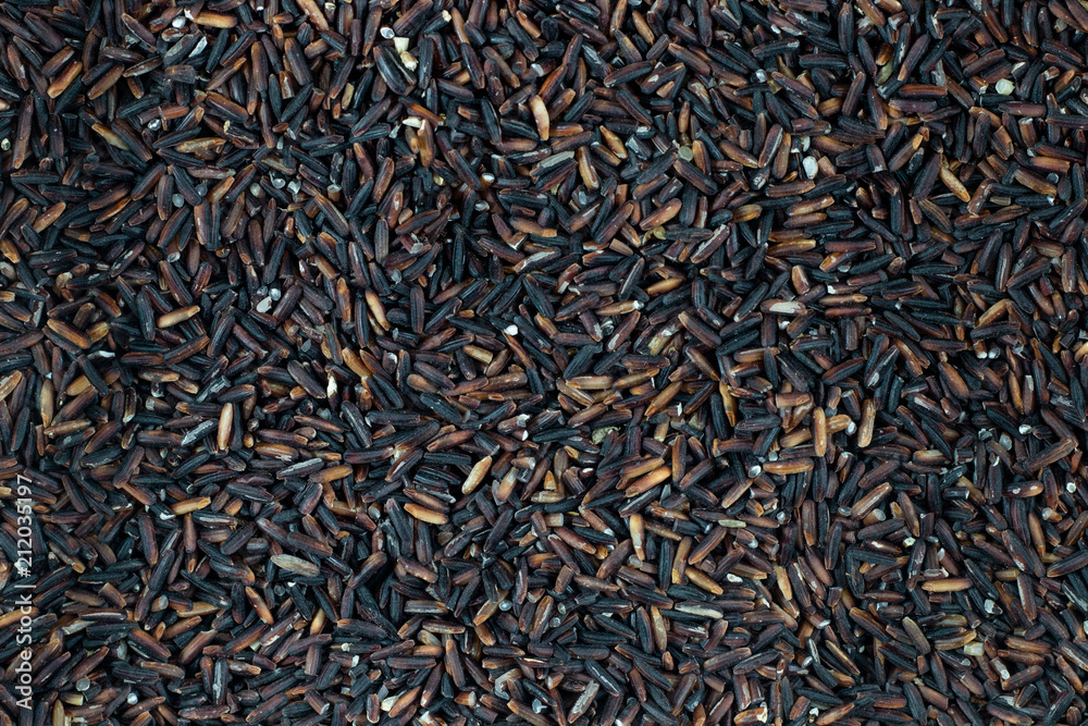 black rice whole grains background