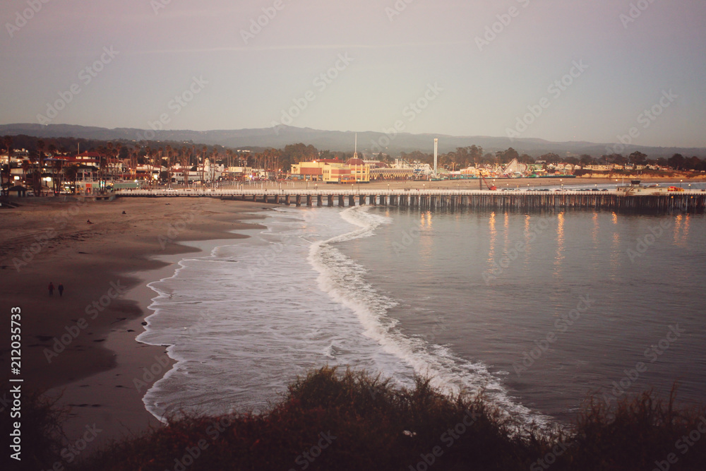 Sunset above the ocean pier in Santa Cruz, California, USA