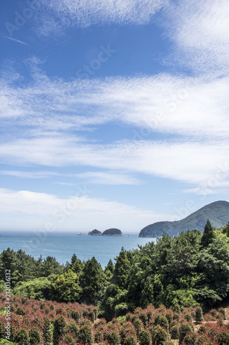 The mountains and sea scenery with blue sky