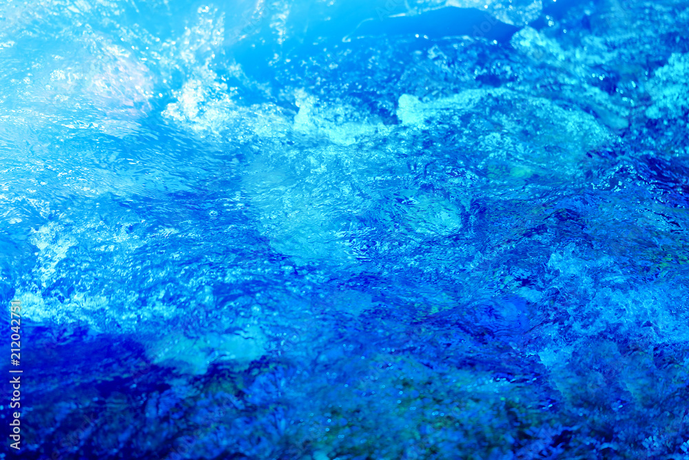 Photo background of bright bubbling water