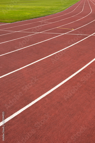 Red running track in stadium