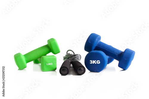 Dumbbells and skipping rope for a fitness training photo