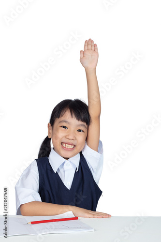 Asian Chinese little girl wearing school uniform studying