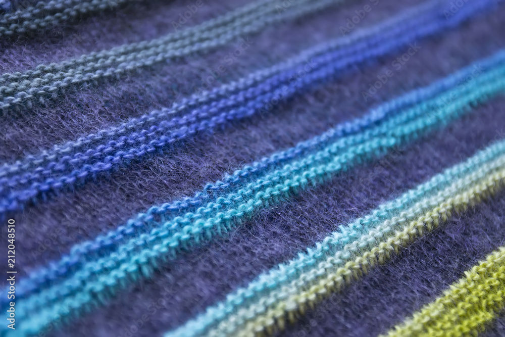 Fototapeta premium Macro hand made knitting background. Sectional yarn