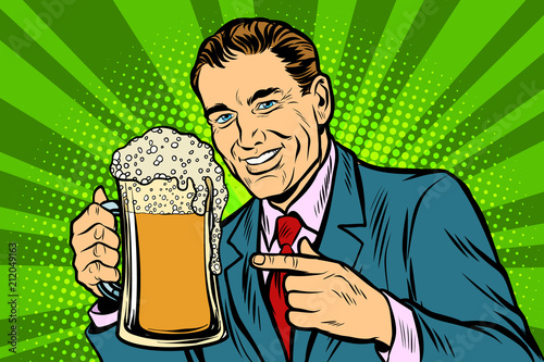 Man with a mug of beer foam