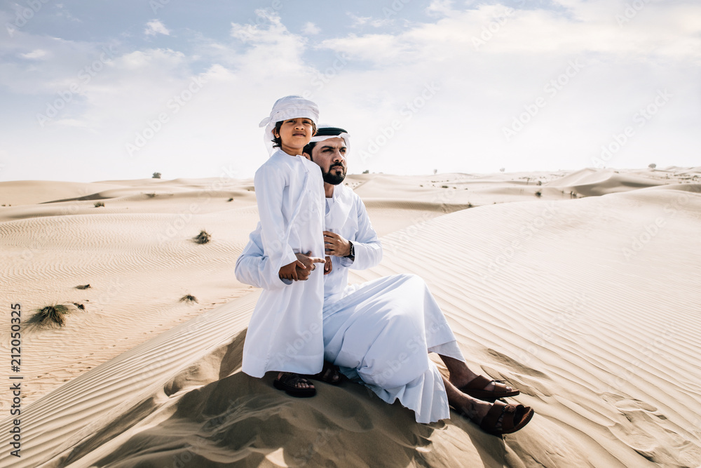 Fototapeta premium father and son spending time in the desert