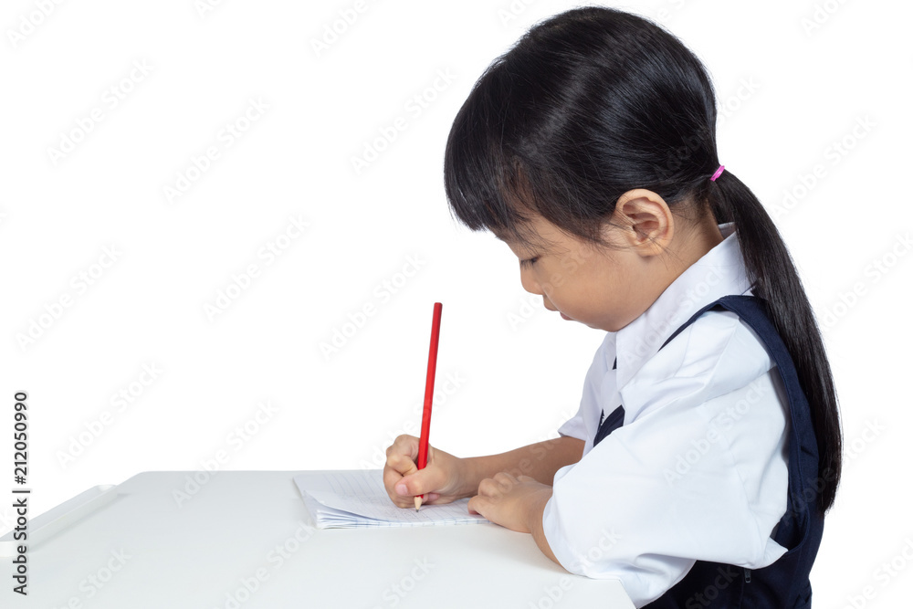 Asian Chinese little girl wearing school uniform studying Asian Chinese little girl wearing school uniform studying
