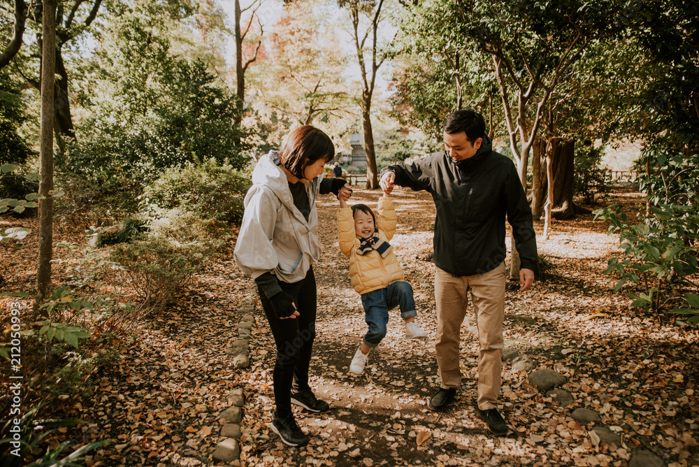 Happy japanese family spending time outdoor Happy japanese family spending time outdoor