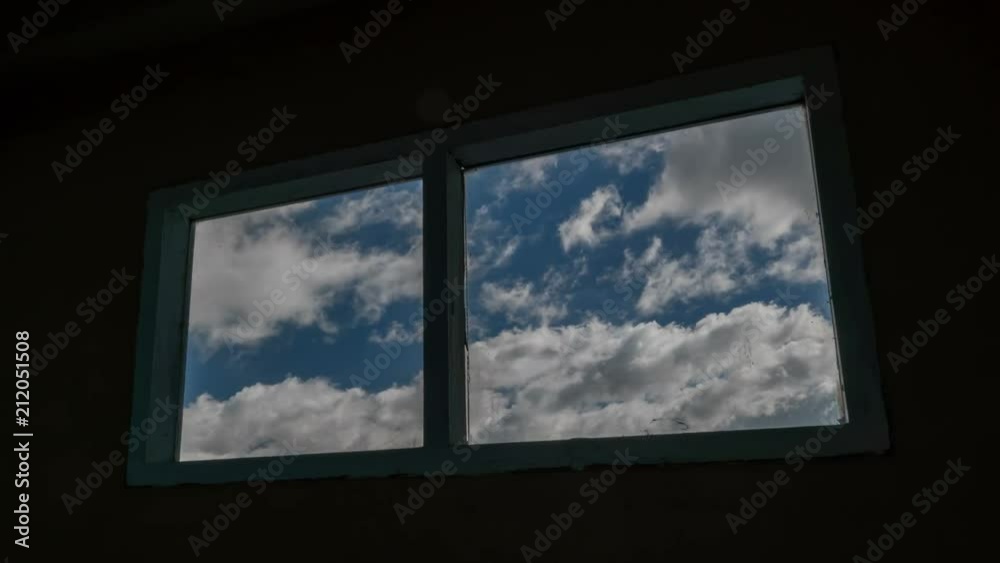 Time lapse shot of old windows with clouds moving in background
Time lapse shot of old windows with clouds moving in background