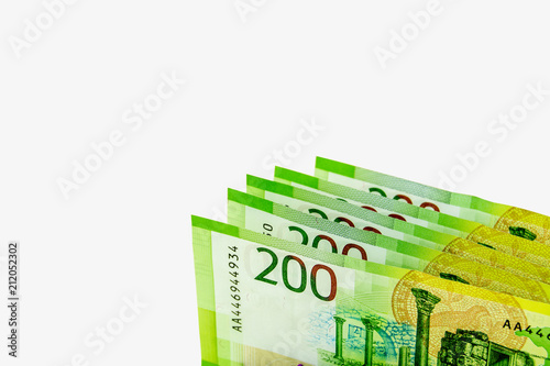 Russian cash. Banknotes in 200 rubles on a light background. photo