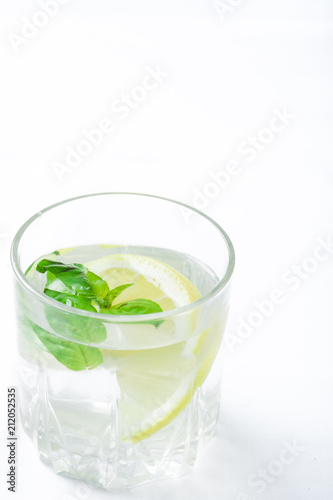 Basil lemon water. Drink infused water cocktail. Healthy lifestyle concept. Copy space