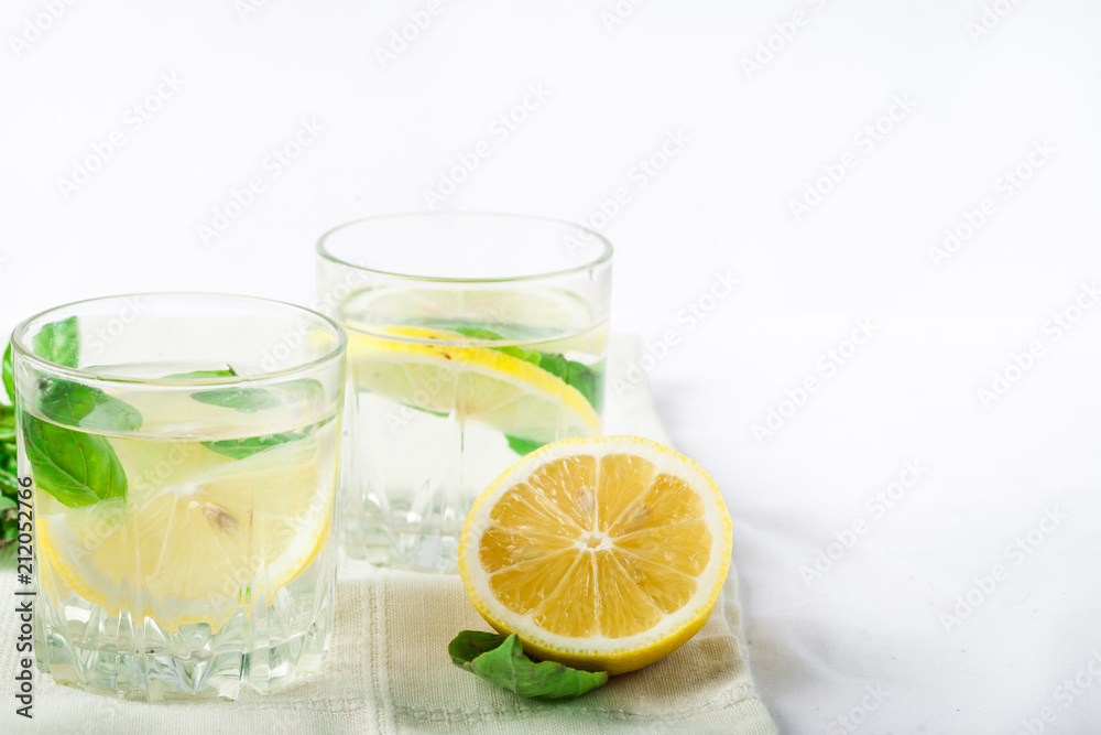 Basil lemon water. Drink infused water cocktail. Healthy lifestyle concept. Copy space