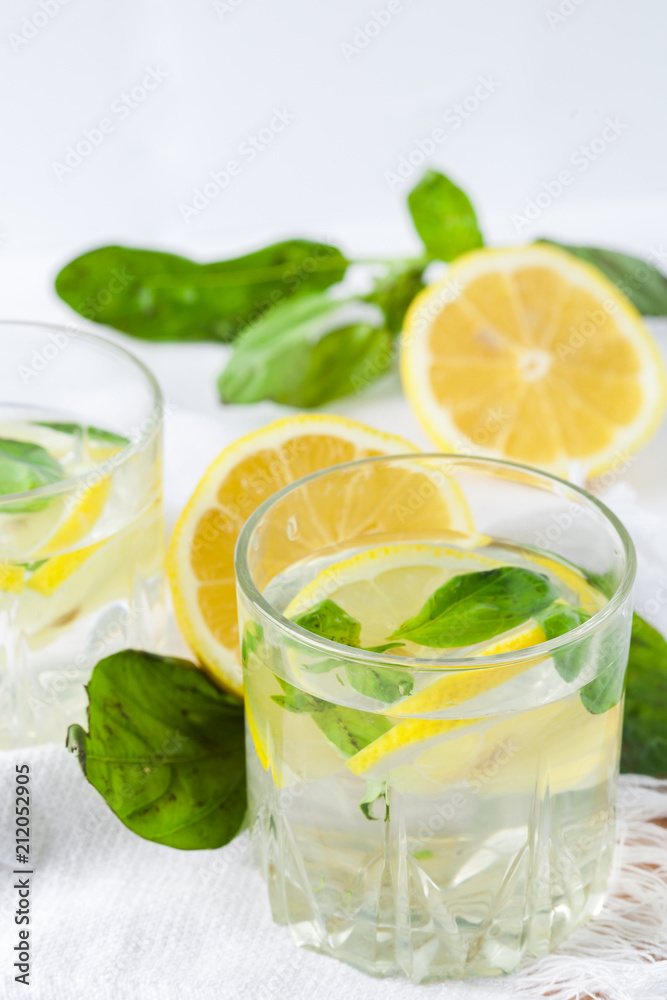 Basil lemon water. Drink infused water cocktail. Healthy lifestyle concept. Copy space Basil lemon water. Drink infused water cocktail. Healthy lifestyle concept. Copy space