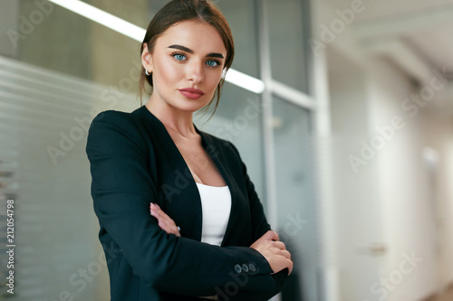 Beautiful Business Woman In Office Portrait