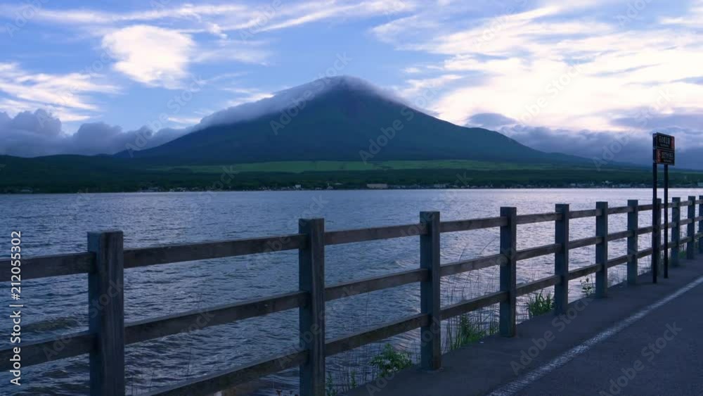 Walking the Lakeside Road Seeing Mt. Fuji over the Lake Walking the Lakeside Road Seeing Mt. Fuji over the Lake