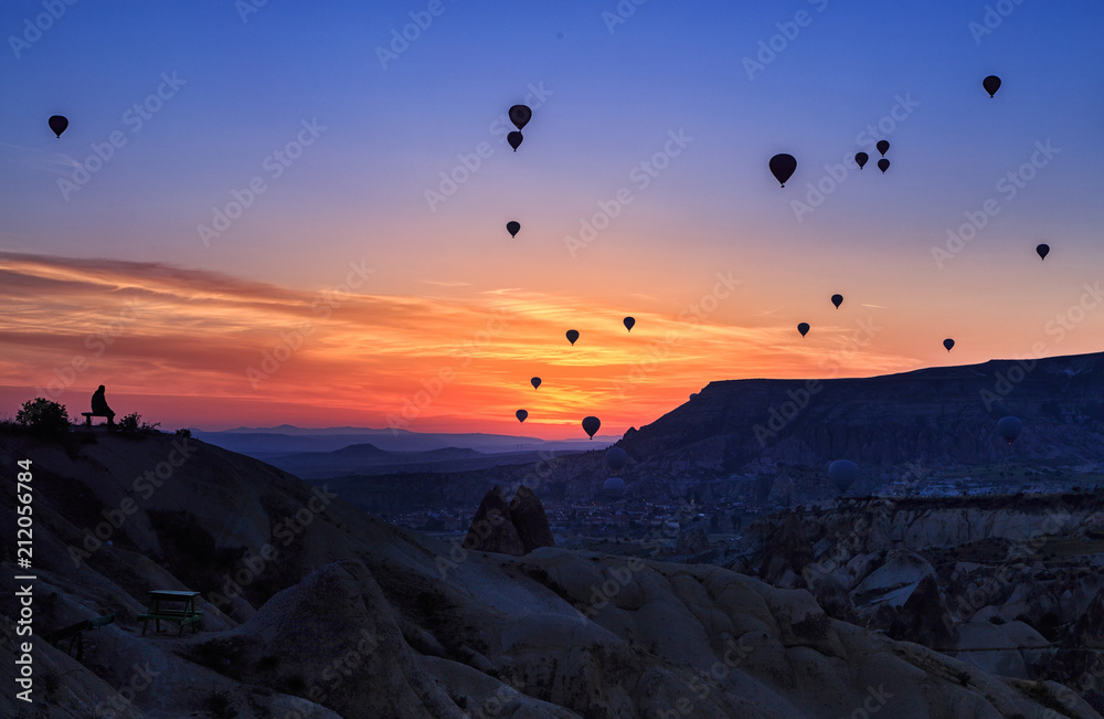 Unreal landscape of Cappadocia. Colorful sunset in valley. G reme National Park of Turkey, background