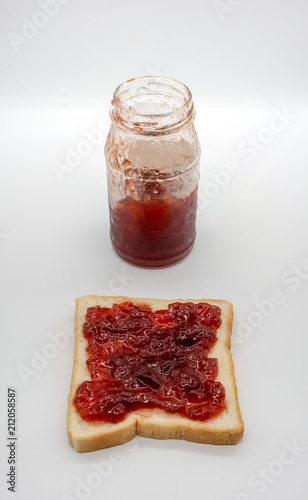 Wallpaper Mural homemade slide bread with strawberry jam isolated on white Torontodigital.ca