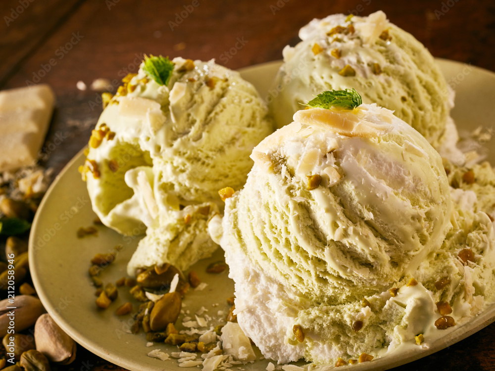 Scoops of Gourmet Pistachio Ice Cream in Dish Scoops of Gourmet Pistachio Ice Cream in Dish