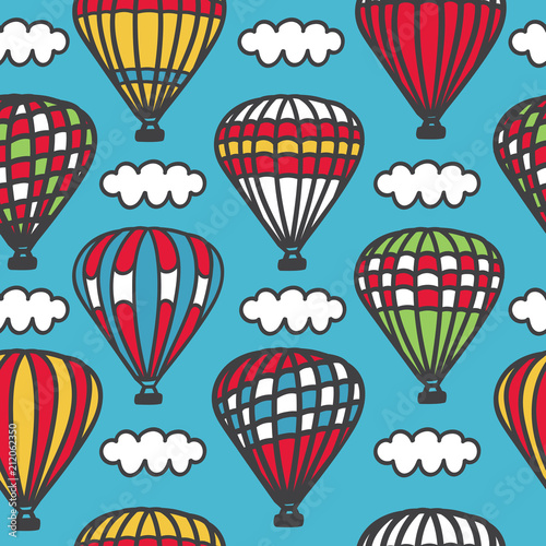 Cappadocia. Bright vector seamless pattern with cute doodle striped hot air balloons with baskets and clouds in the sky. Colorful hand drawn cartoon elements on blue background.