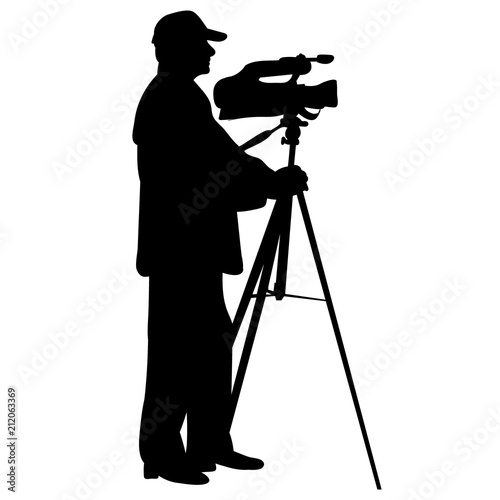 silhouette of man with video camera