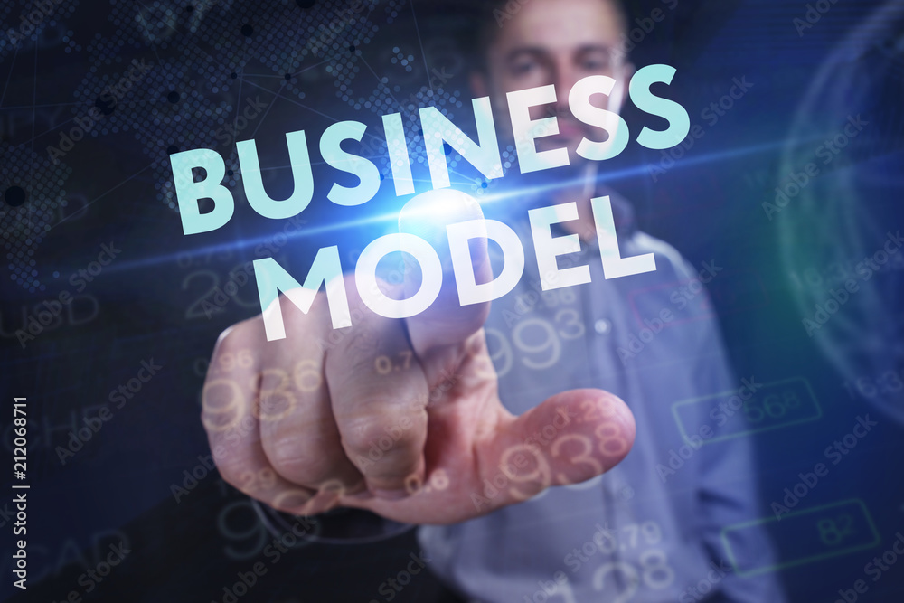 The concept of business, technology, the Internet and the network. A young entrepreneur working on a virtual screen of the future and sees the inscription: Business model The concept of business, technology, the Internet and the network. A young entrepreneur working on a virtual screen of the future and sees the inscription: Business model