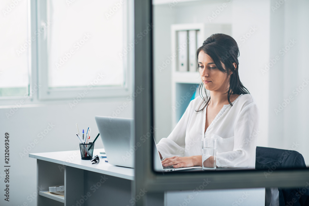 Business Woman Reading an Email Through Office Glass Business Woman Reading an Email Through Office Glass