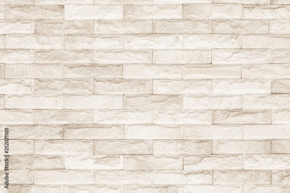 Cream and white brick wall texture background. Brickwork or stonework flooring interior rock old pattern clean concrete grid uneven bricks design stack. Cream and white brick wall texture background. Brickwork or stonework flooring interior rock old pattern clean concrete grid uneven bricks design stack.