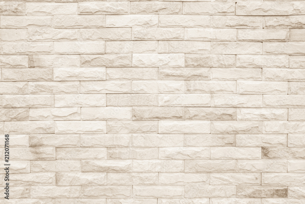Cream and white brick wall texture background. Brickwork or stonework flooring interior rock old pattern clean concrete grid uneven bricks design stack. Cream and white brick wall texture background. Brickwork or stonework flooring interior rock old pattern clean concrete grid uneven bricks design stack.