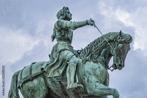 Bronze equestrian statue of Jeanne d'Arc (Joan of Arc, 1855) in the centre of Place du Martroi (Martroi square) in Orleans, France. photo